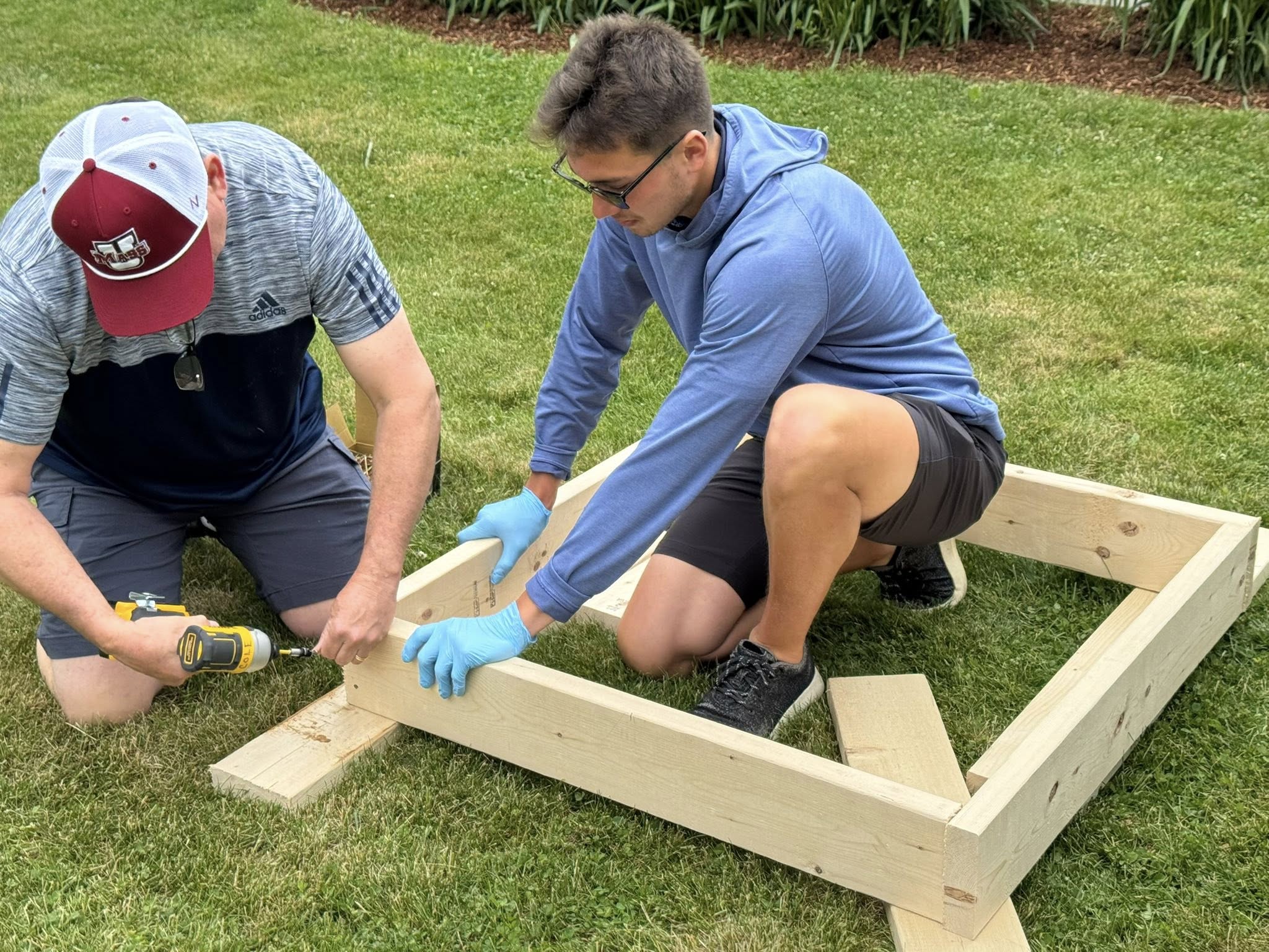 Captain John Parker's Lexington Company helps build fire boxes for the 250th Bunker Hill Reenactment
