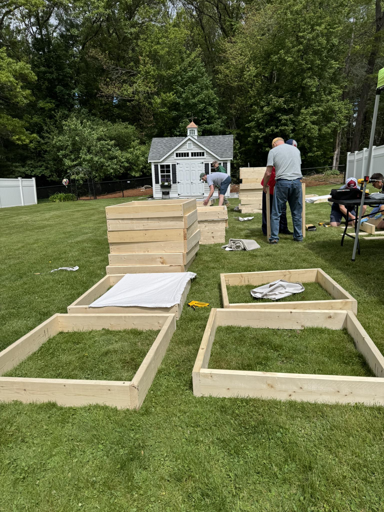Captain John Parker's Lexington Company helps build fire boxes for the 250th Bunker Hill Reenactment